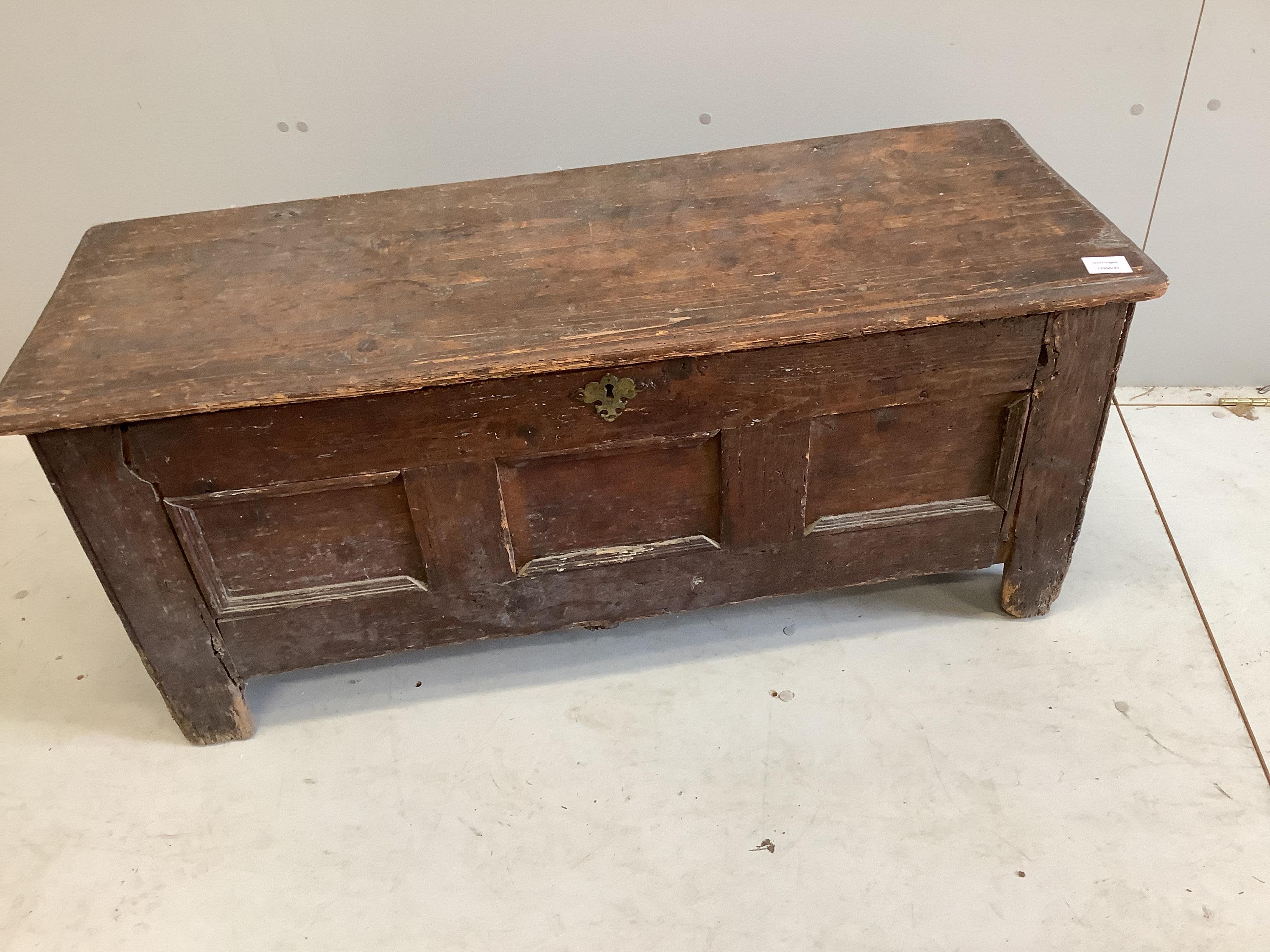 An 18th century panelled pine coffer, width 112cm, depth 41cm, height 50cm